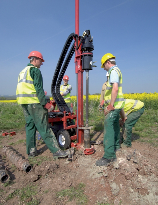 Engineers drilling in the field